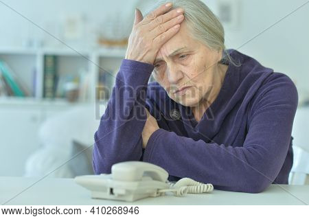 Close Up Portrait Of Tired Senior Woman