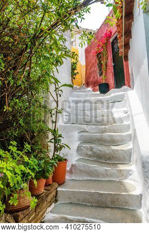 Street In Plaka District, Athens, Greece. Plaka Is Tourist Attraction Of Athens. Vertical View Of Na