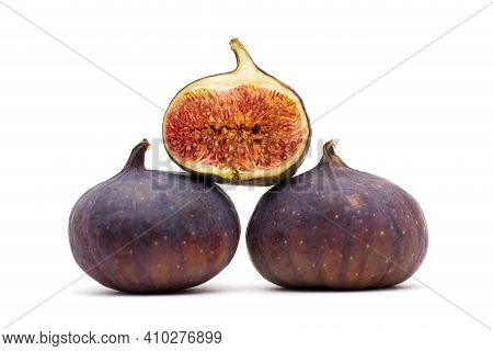 Three Purpel Brazil Figs Isolated On White