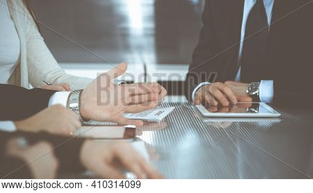 Business People Working Together At Meeting In Modern Office. Unknown Businessman And Woman With Col