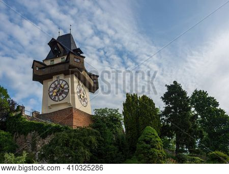 The Famous Clock Tower (grazer Uhrturm) And Gardens On Schlossberg Hill, Graz, Styria Region, Austri