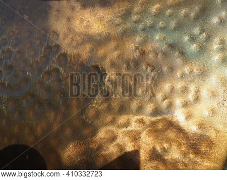 Metal Bronze Textured Plate. Bronze Or Copper Polished Surface With Dents, Scratches And Indentation