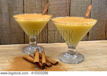 Boza And Cinnamon Sticks, Traditional Turkish Cuisine Drinks, On Wooden Bamboo Background