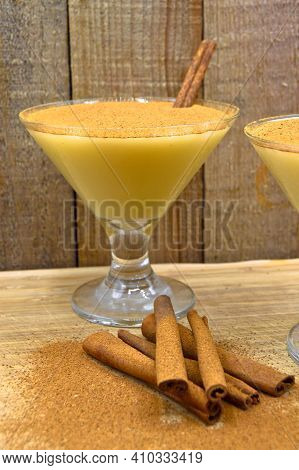 Boza And Cinnamon Sticks, Traditional Turkish Cuisine Drinks, On Wooden Bamboo Background
