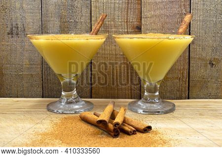 Boza And Cinnamon Sticks, Traditional Turkish Cuisine Drinks, On Wooden Bamboo Background