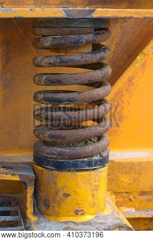 An Uncompressed Thick Spring In Industrial Equipment