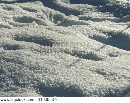 Abstract And Textured White Snow Background In Winter