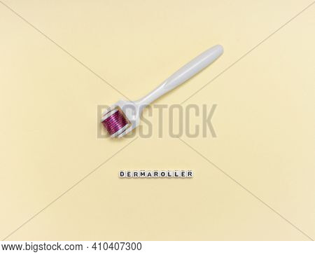 White Roller With Mesotherapy Handle And The Inscription 