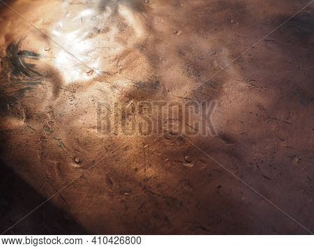 Metal Bronze Textured Plate. Bronze Or Copper Polished Surface With Dents, Scratches And Indentation