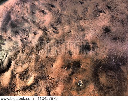 Metal Bronze Textured Plate. Bronze Or Copper Polished Surface With Dents, Scratches And Indentation