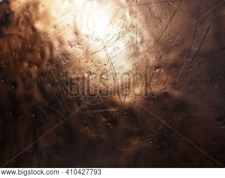 Metal Bronze Textured Plate. Bronze Or Copper Polished Surface With Dents, Scratches And Indentation