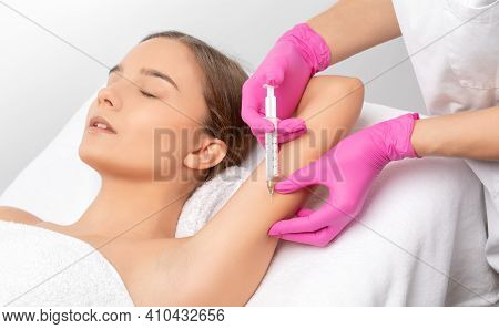 Aesthetic Cosmetologist Makes Lipolytic Injections To Burn Fat On The Arm And Body Of A Woman. Femal