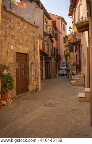 Modern Cars On Street Of  Medieval Town Of Orte In Italy.