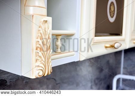 Selective Focus Fragment Of Beige Wooden Cabinetry Kitchen Carved Detail. Carved Decorative Detail. 