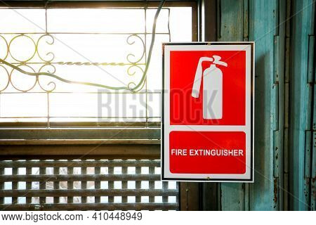 Fire Extinguisher Position Sign Beside The Window