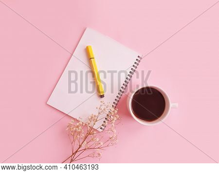 Coffee Cup, Notepad, Flower On A Colored Background