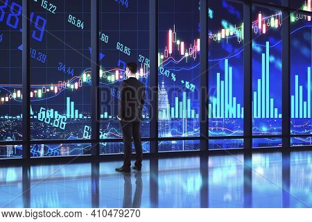 Stock Market Analysis Concept With Businessman Back Lokking On Digital Screen With Financial Graphs,