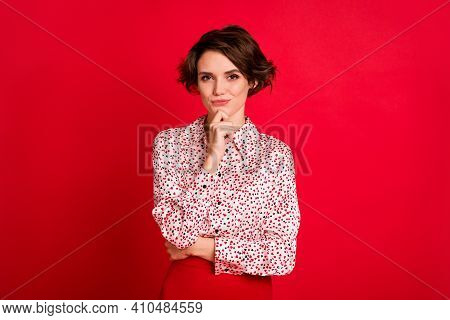 Portrait Of Lovely Minded Cheerful Brown-haired Girl Overthinking Solution Isolated Over Bright Red 