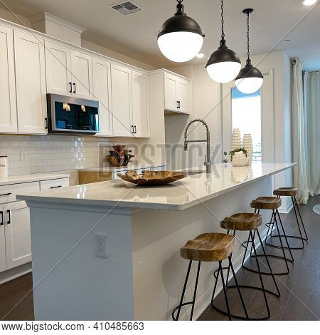 A Beautifully Appointed Kitchen In A Townhome In Orlando, Florida.
