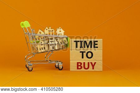 Time To Buy Real Estate Symbol. Wooden Blocks, Words 'time To Buy' On Beautiful Orange Background. S