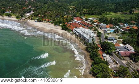 Aerial View Of Karang Bolong Beach And Its Wonderful Sunset View. At Anyer Beach With Noise Cloud An
