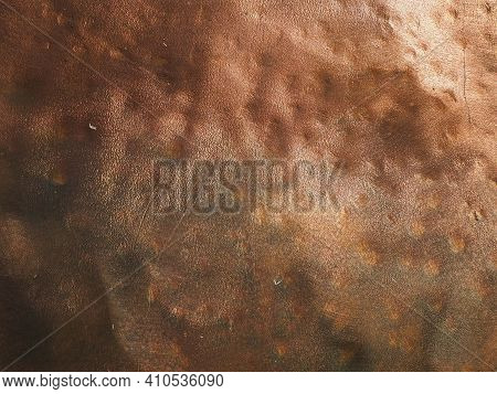 Metal Bronze Textured Plate. Bronze Or Copper Polished Surface With Dents, Scratches And Indentation