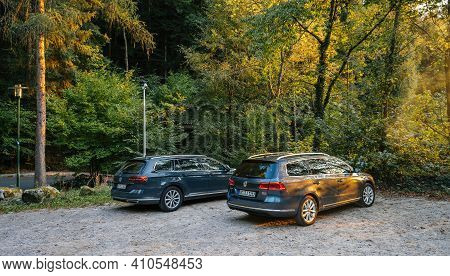 Germany - Oct 7, 2018: Rear View Of Two Volkswagen Passat Electric Cars Parked In German Outdoor Par