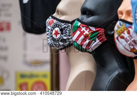 Subotica, Serbia - November 20, 2020: Dummies With Facemask With The Coat Of Arms Hungary And A Face