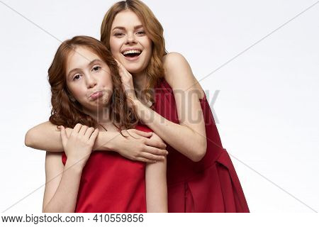 Mom And Daughter Red Dress Hug Family Joy Friendship