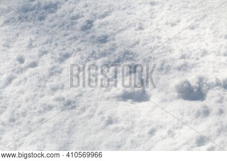 Winter Snow. Snow Texture Top View Of The Snow. Texture For Design. Snowy White Texture. Snowflakes.