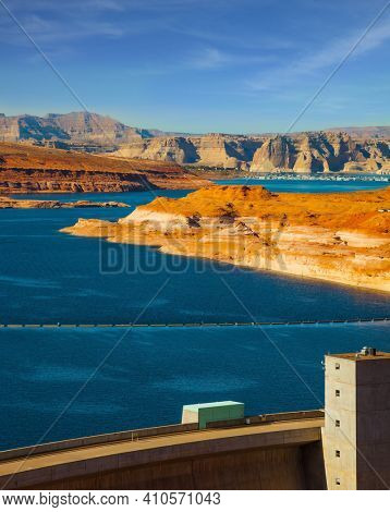 Humanity 's great creation is a dam across the Colorado River. Glen Canyon Dam across the Colorado River. Concept of active, ecological and photo toursm