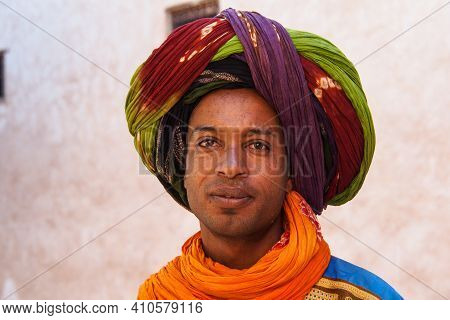 Telouet, Morocco - Oct 21, 2019: Guide In The Ruins Of Glaoui Kasbah At Telouet In The Atlas Mountai