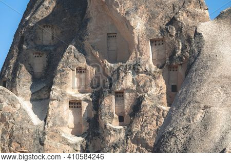 Cave dwellings in stony mountains of Cappadocia, Turkey