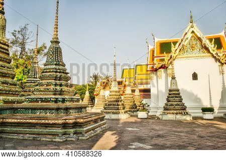 Wat Pho Temple In Bangkok, Thailand, Showing Phra Chedi Rai