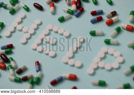 Help Words Made Of White Pills Closeup. Medication Treatment Concept