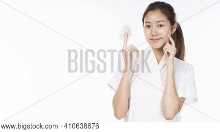 Cosmetology, Hygiene, Removal, Spa, Freshness Skin Care Concept. Beauty Asian Young Woman Wear Bathr