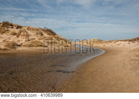 Walking Through The Slufter Valley On The Wadden Island Of Texel, A Sandy Plain That Is Openly Conne