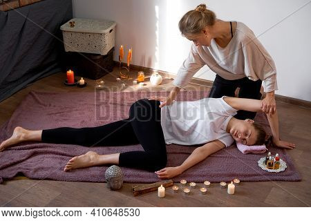 Relax And Enjoy In Spa Salon Getting Thai Massage By Professional Masseur Woman Lying Floor Blanket 