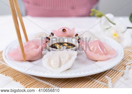 Chinese Har Gao Dim Sum Dumplings In The Shape Of A Swan, Pink And White Color
