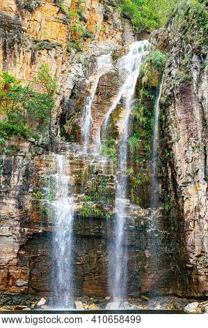 Close Up View At The Waterfall Of Canyons Of Furnas, At Capitólio Mg, Brazil. Waterfall Flowing Betw