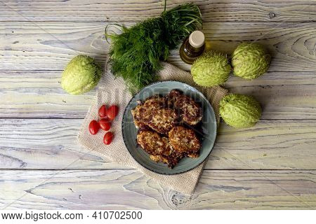 The Fruits Of Mexican, Healthy Liana (sechium Edule) And Pancakes From It, Cherry Tomatoes, Dill And