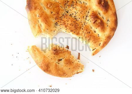 Slices Of Ramadan Pita (ramazan Pidesi) Traditional Turkish Bread For Holy Month Ramadan On White Ba