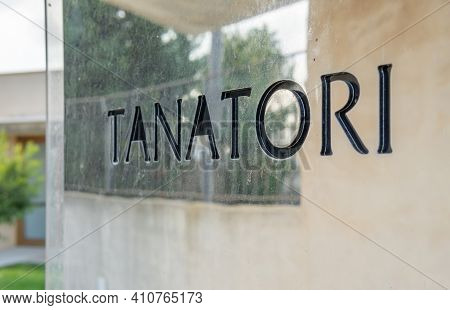 Close-up Of A Metal Plate With The Word 