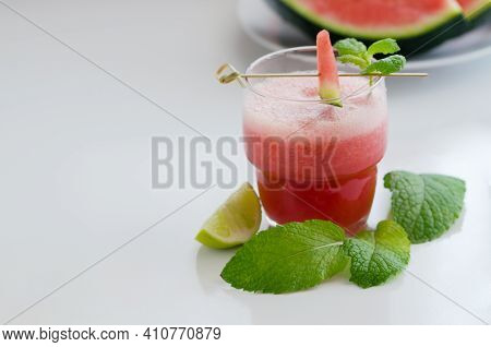 Watermelon Smoothie  With Lemon And Mint To Cool Down On Hot Days. Refreshening Fruit Drink Backgrou