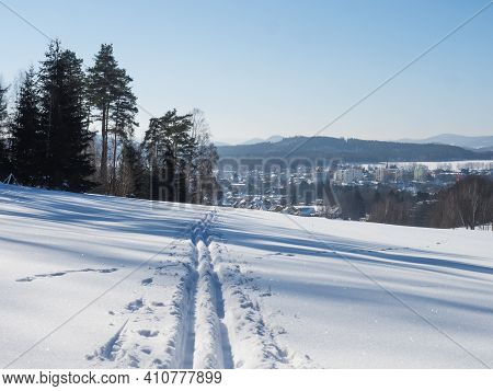 Winter Landscape With View Of Village Town Cvikov And Ski Run Trail On Snow-covered Fields And Snowy