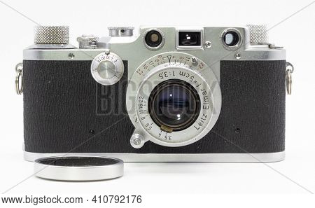 DUSSELDORF, GERMANY - FEBRUARY, 2021: Famous 35mm film camera Leica IIIc isolated on white background