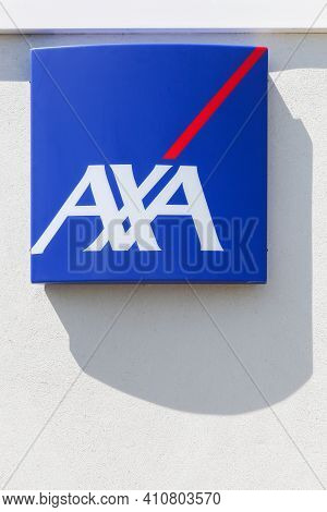 Reyrieux, France - May 20, 2017: Axa Insurance Logo On A Wall. Axa Is A French Multinational Insuran