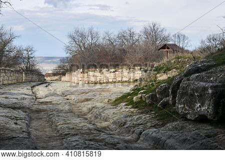 Ancient Road With Ruts From Carts In Stone Among The Ruins Of The Medieval City Of Chufut-kale, Crim