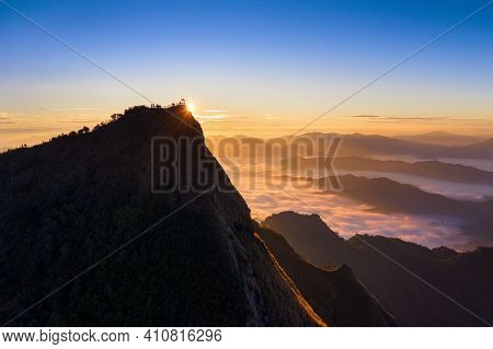 Phu Chi Dao At Sunrise In Chiang Rai, Thailand.