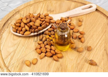 Bottle Of Apricot Seed Oil Prunus Armeniaca Oleum On Woden Background